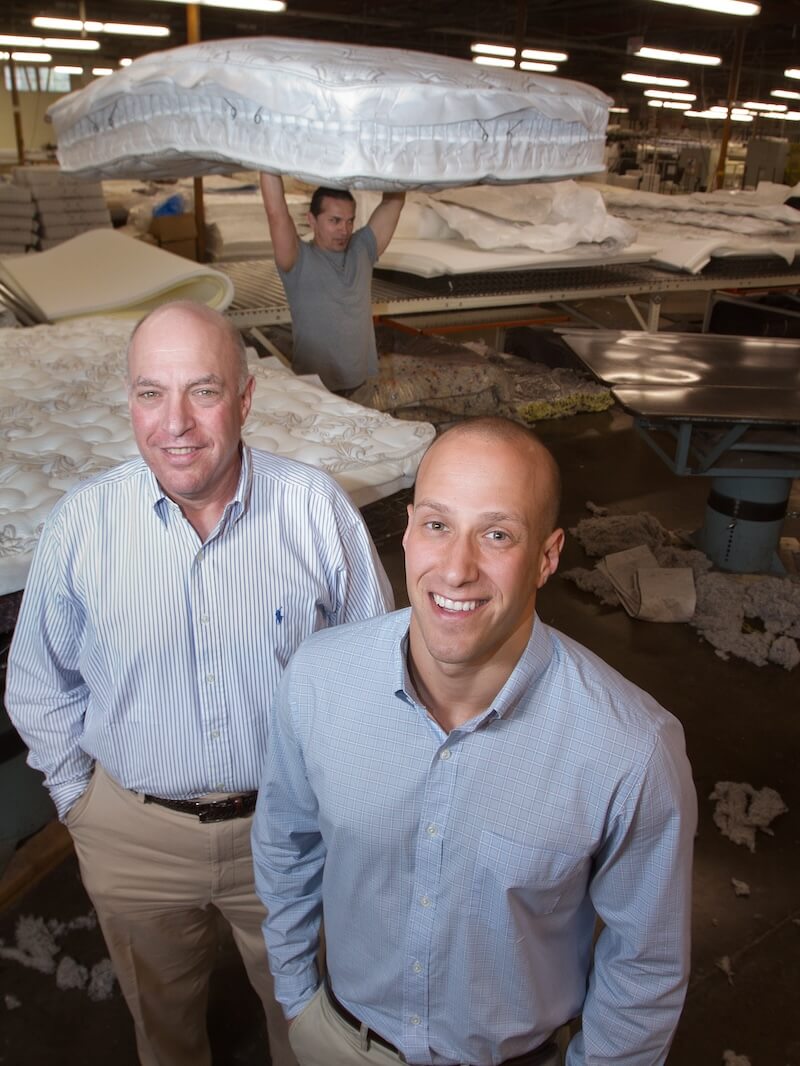 Gold Bond CEO Bob Naboicheck (left) and his son Skip Naboicheck, who is president of the company, represent the third and fourth generations of the family to run the business.  