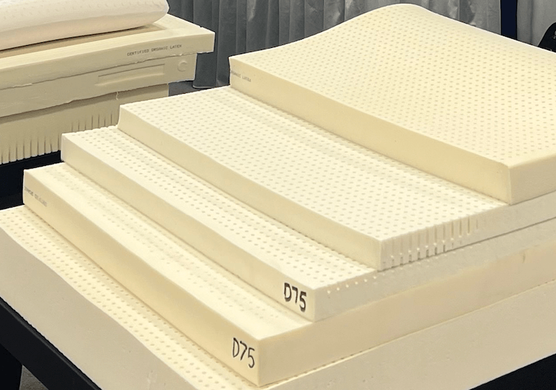 A stack of Milkmen Foam’s organic latex layers demonstrates the quality and uniformity of its products.